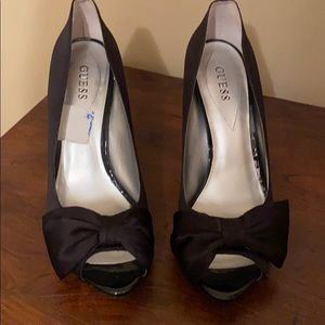 Black peep toe satin and patent leather pumps